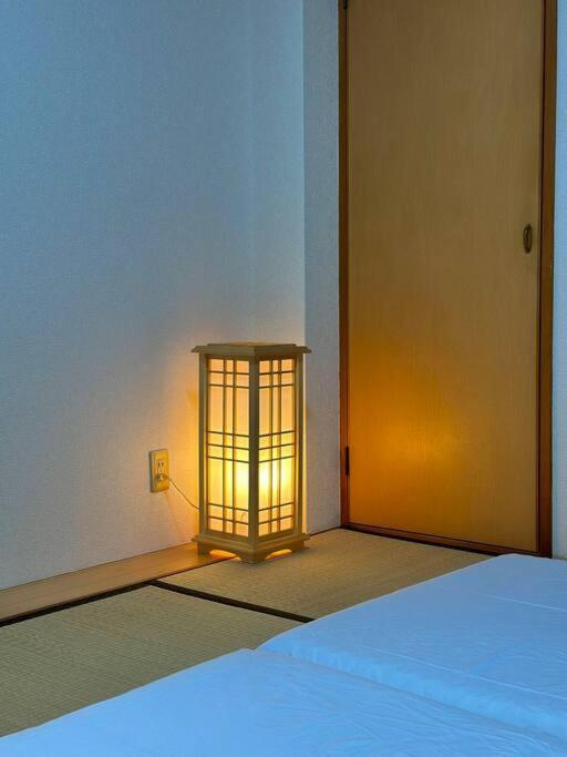 Appartamento 303号室南海線駅2分の明るい和室専用キッチンとバスルーム付き荷物預り *